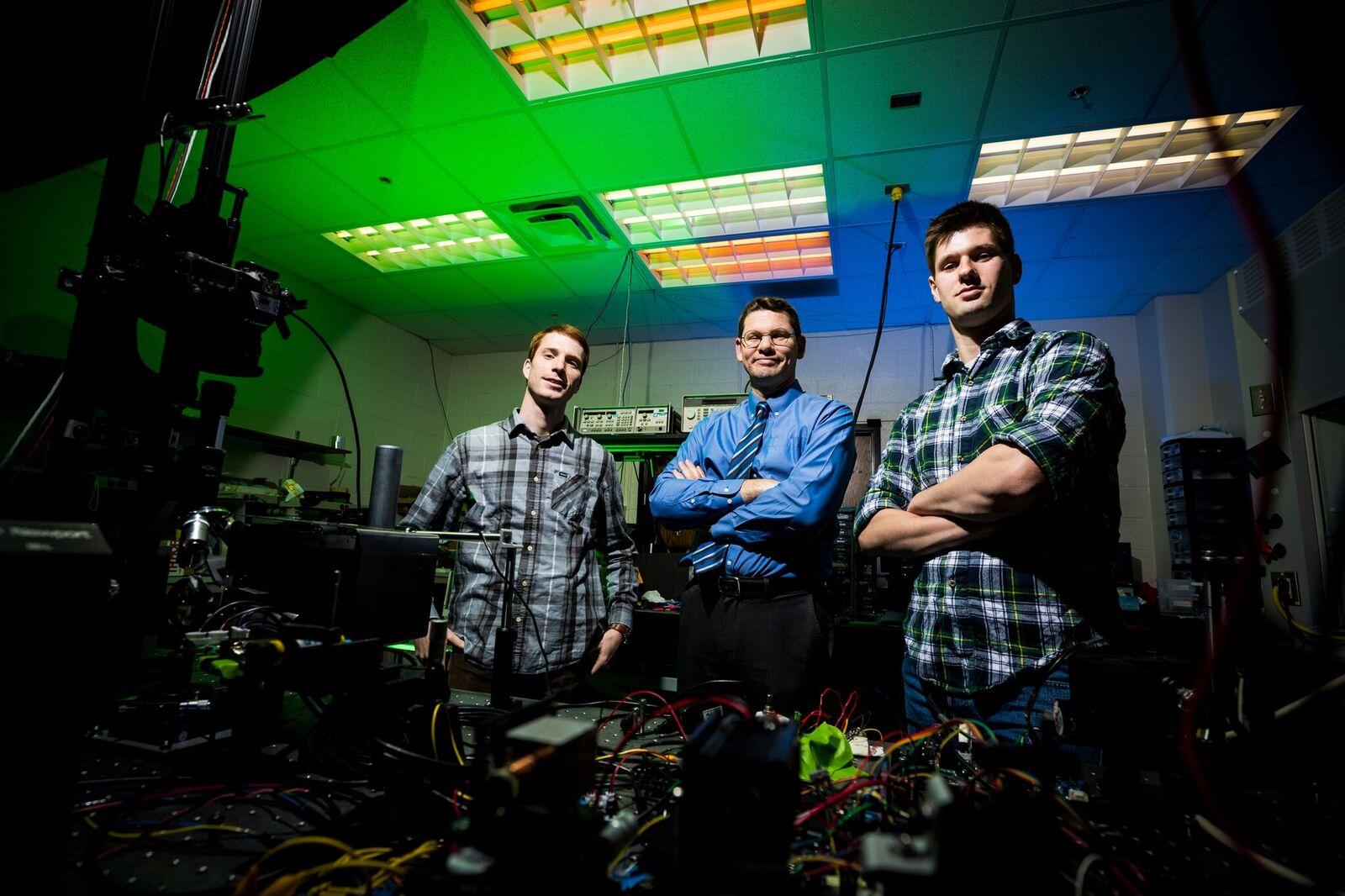 BYU-picture-Dr-Daniel-Smalley-with-student-hologram-researchers 0