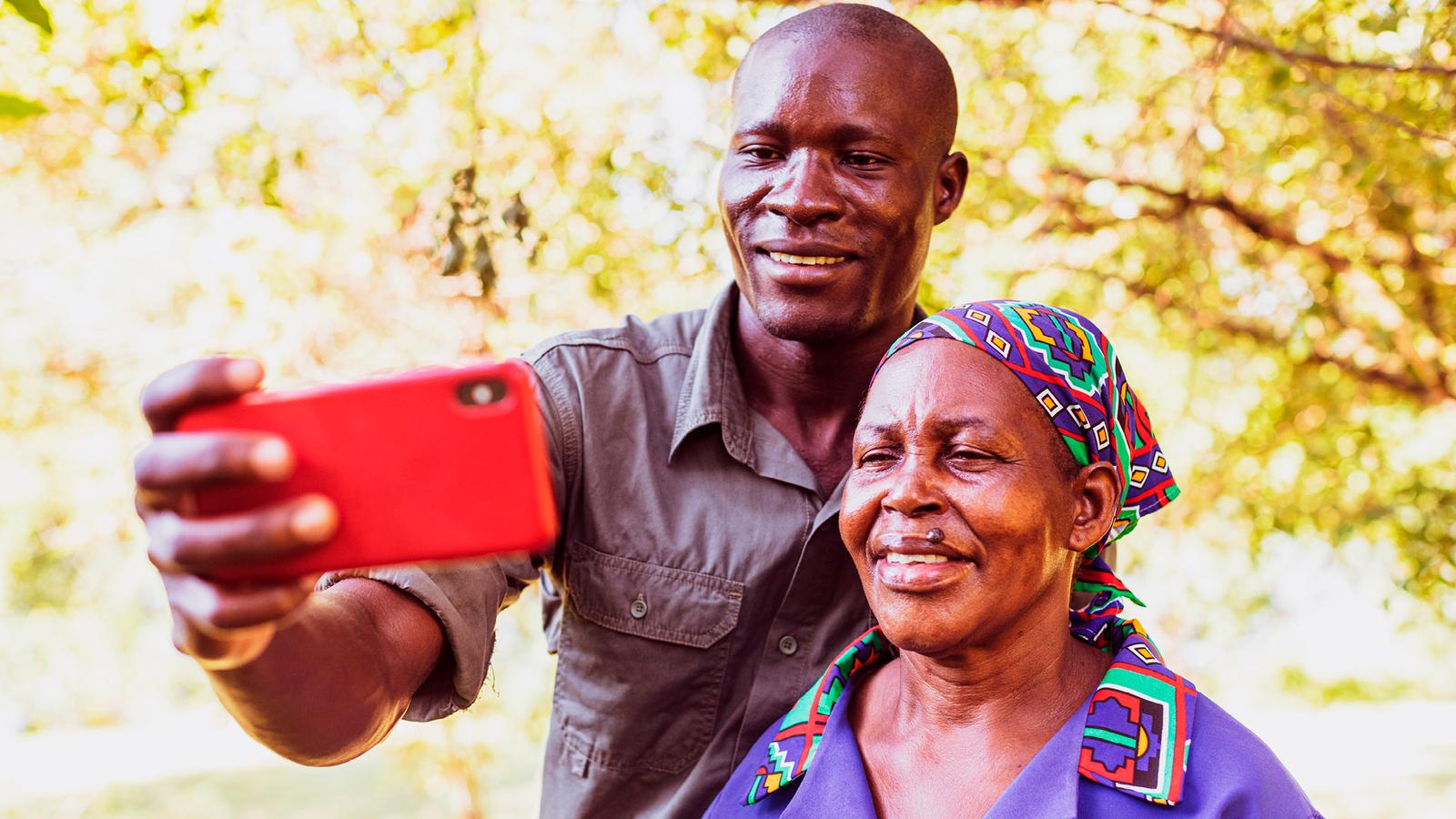 Vodafone Africa.Connected african family with mobile